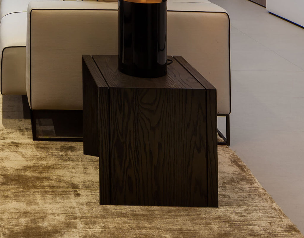 Dark wood Vienna End Table with black cylindrical lamp for stylish living room decor