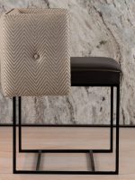 Paris Chair with modern backless design, tufted chevron fabric, and sleek black frame