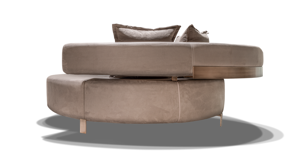 Nice Round Sofa with multi-piece curved design, back cushions, and metallic legs