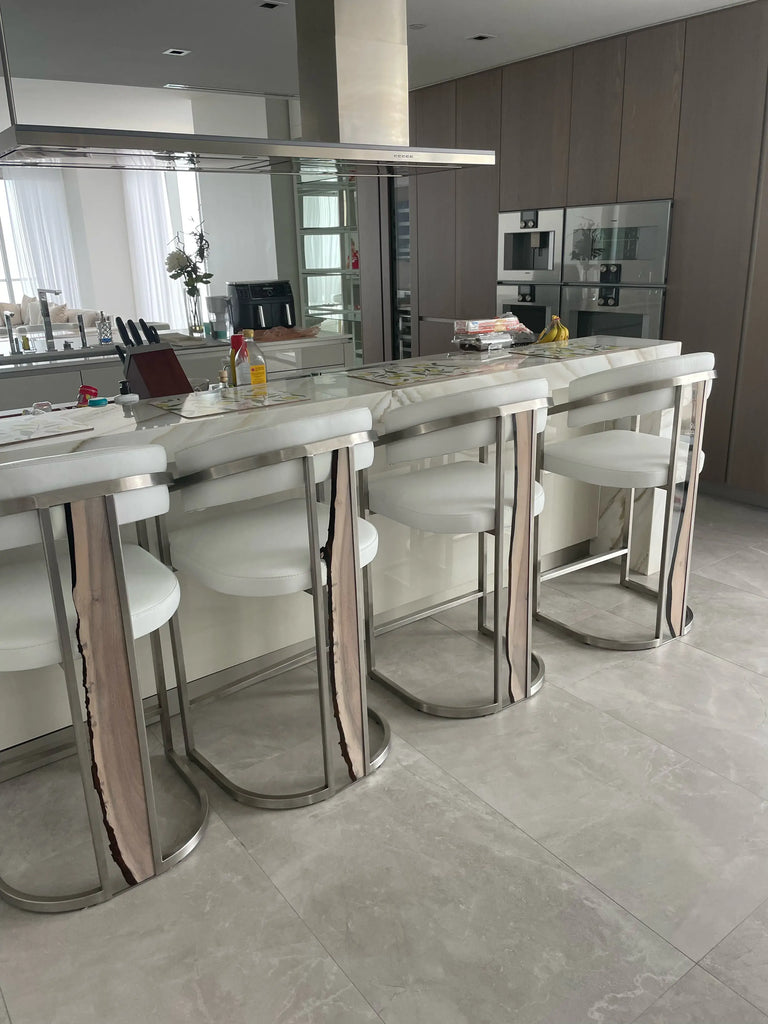 Matera Counter Bar Chair with four white counter height stools at kitchen island