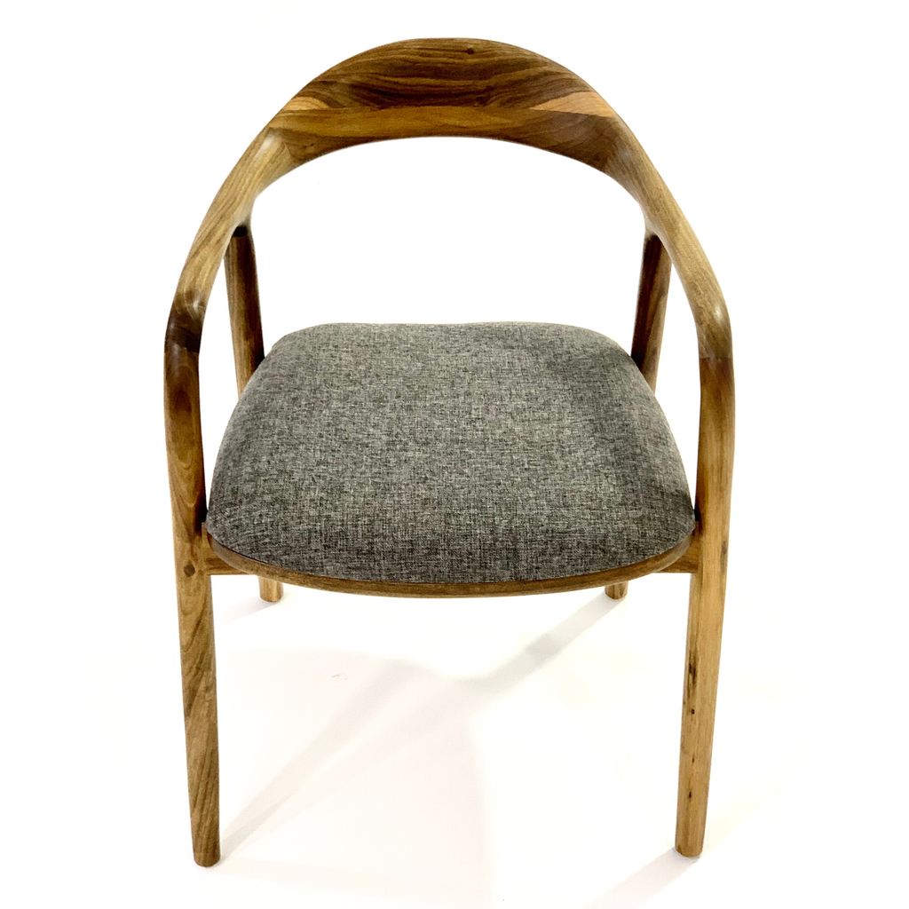 Natural wood Arkas Dining Chair with curved back and gray upholstered seat