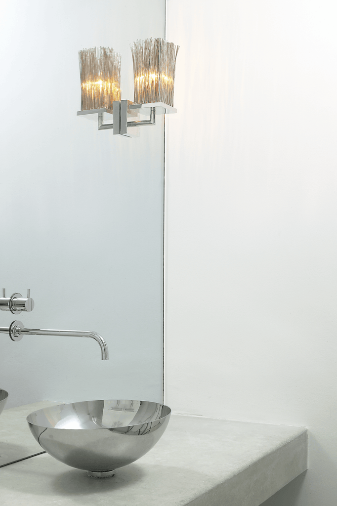 Broom Wall Lamp with two shimmering chain link shades and sleek wall-mounted faucet