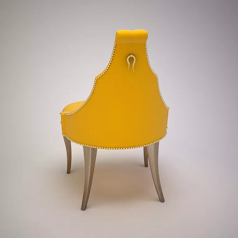 Cali Chair mustard yellow dining chair with silver nailhead trim and gold horseshoe accent