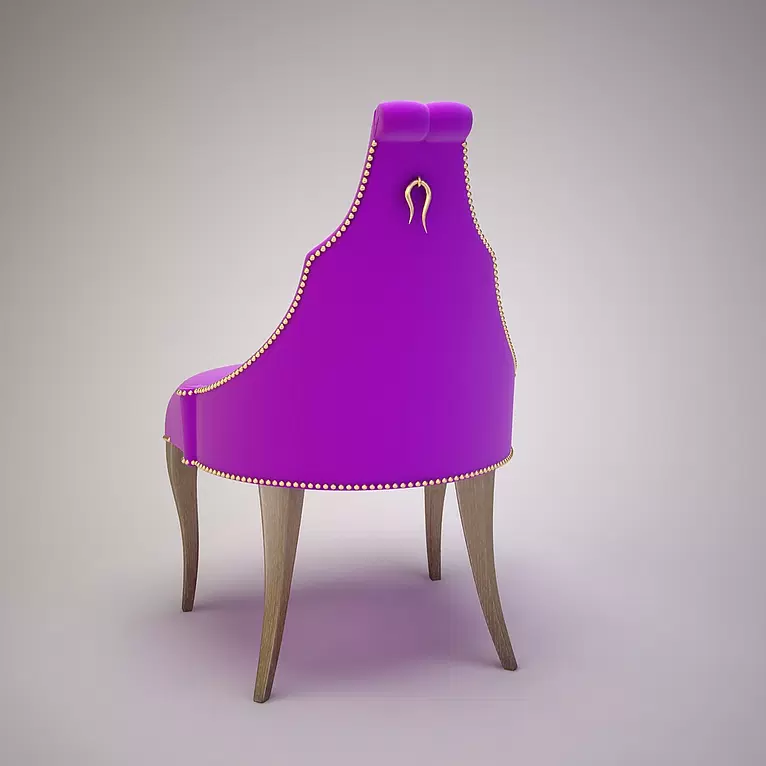 Vibrant purple velvet Cali Chair with gold stud trim and decorative gold back accent