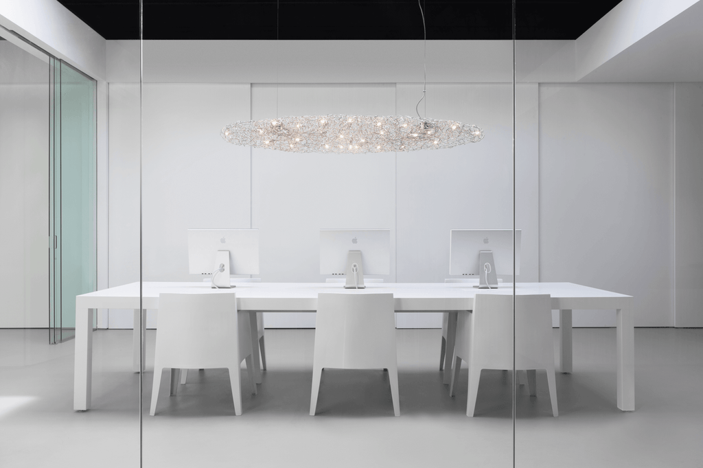 Modern white conference table with six chairs under Crystal Waters Hanging Lamp Cigar