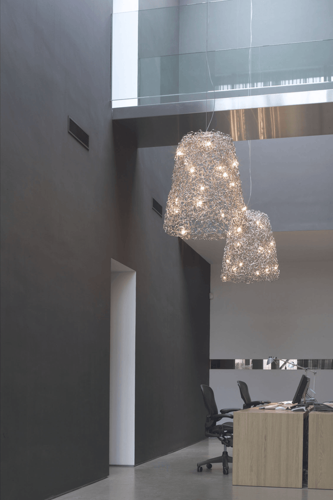 Crystal Waters Hanging Lamp Shade with ornate wire-mesh pendant lights and illuminated bulbs