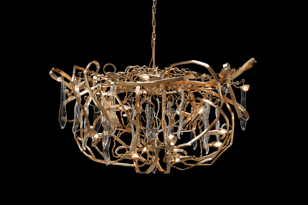 Delphinium Chandelier Oval with ornate gold design and hanging clear crystal accents