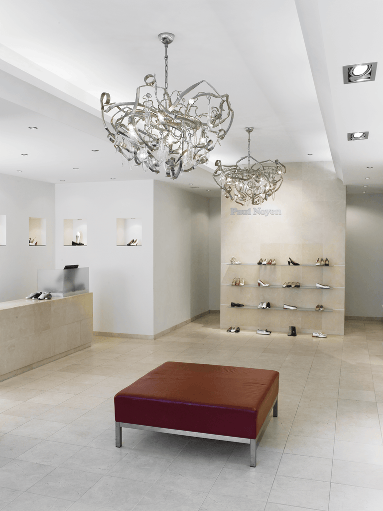 Delphinium Chandelier Round with modern metallic frame and clear crystal accents