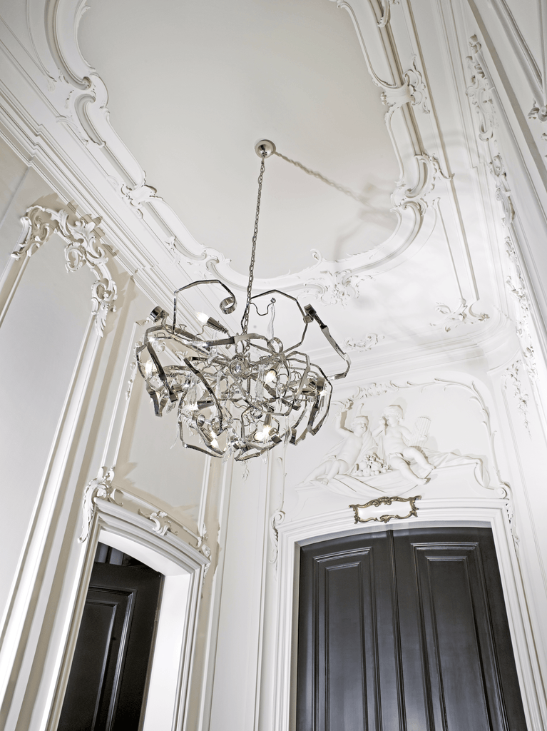 Delphinium Chandelier Round with contemporary sculptural design and silver-toned frame