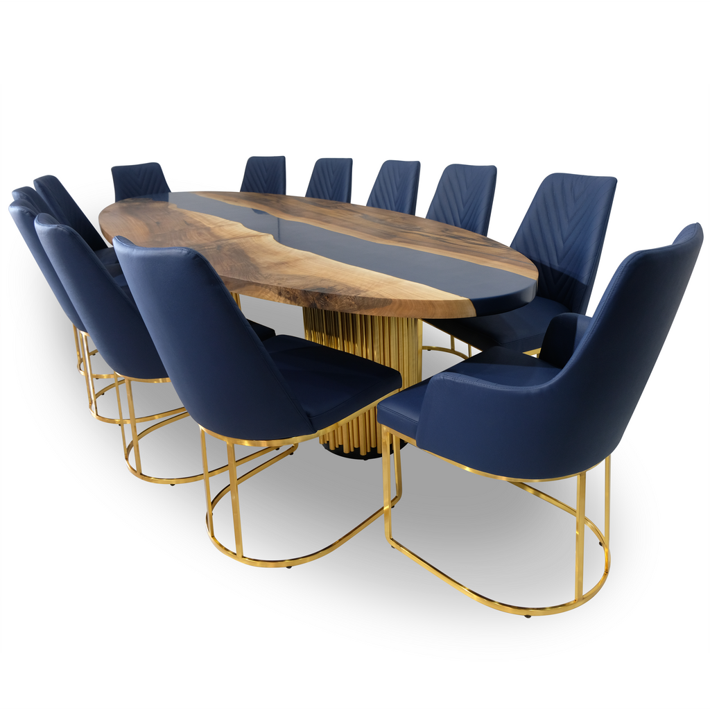 Evohe Blue River Walnut Wood Ellipse Dining Table with dark blue chairs and gold bases