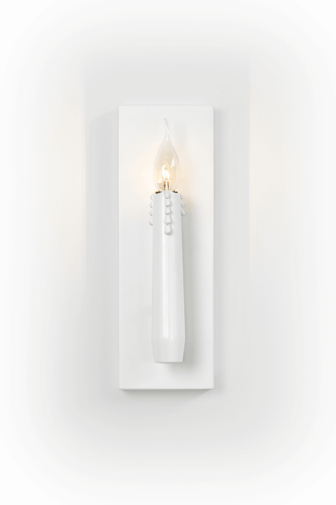 White floating candles wall lamp with drip design and flame-shaped bulb for ambient lighting