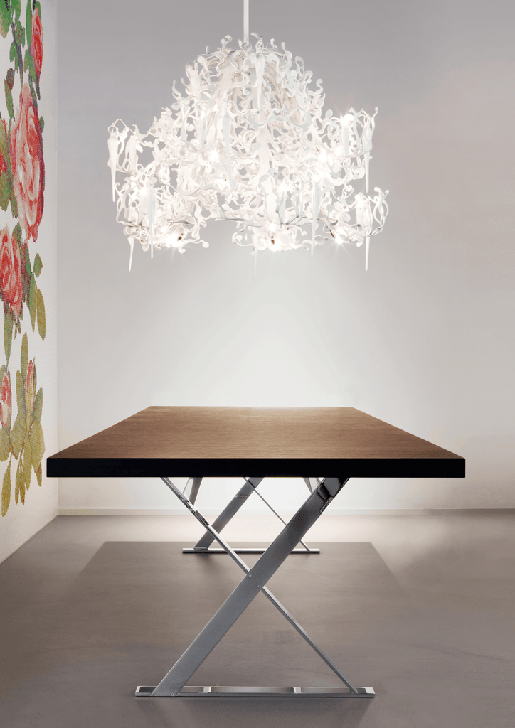 Contemporary dining table with Flower Power Chandelier Round featuring white interconnected figures