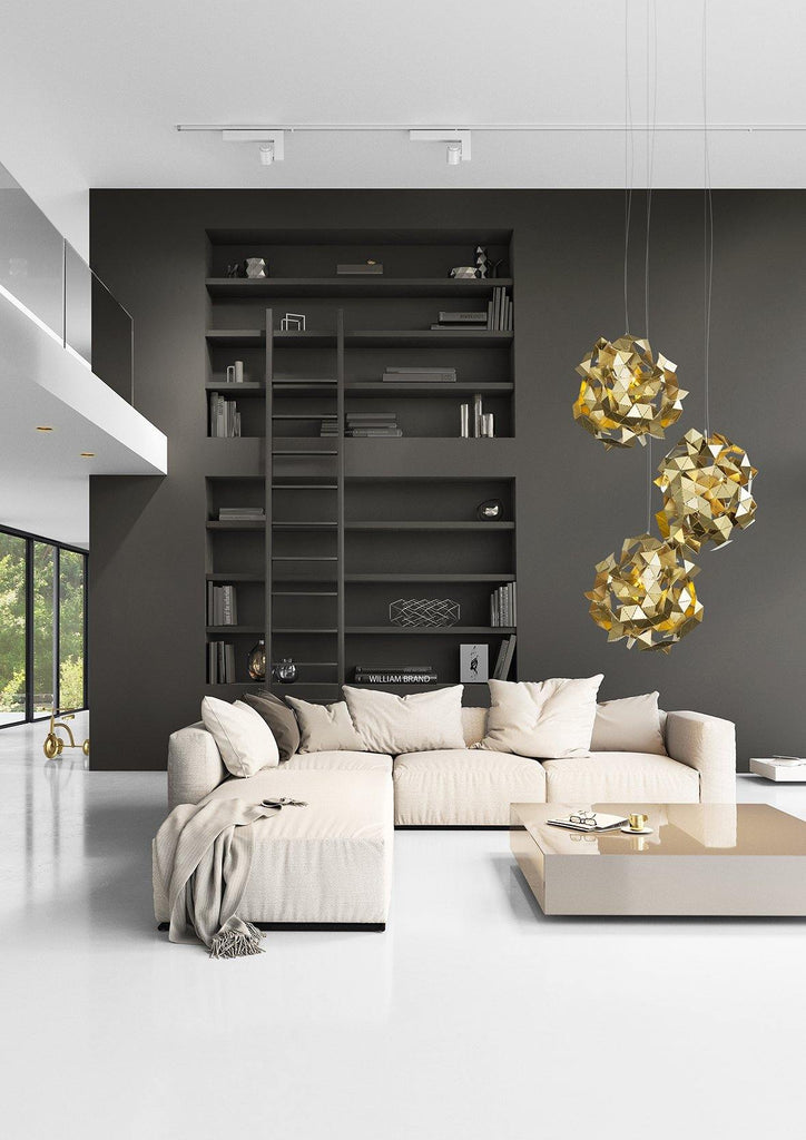 Modern living room with Fractal Cloud L-shaped sofa, sleek coffee table, and gold pendant lights