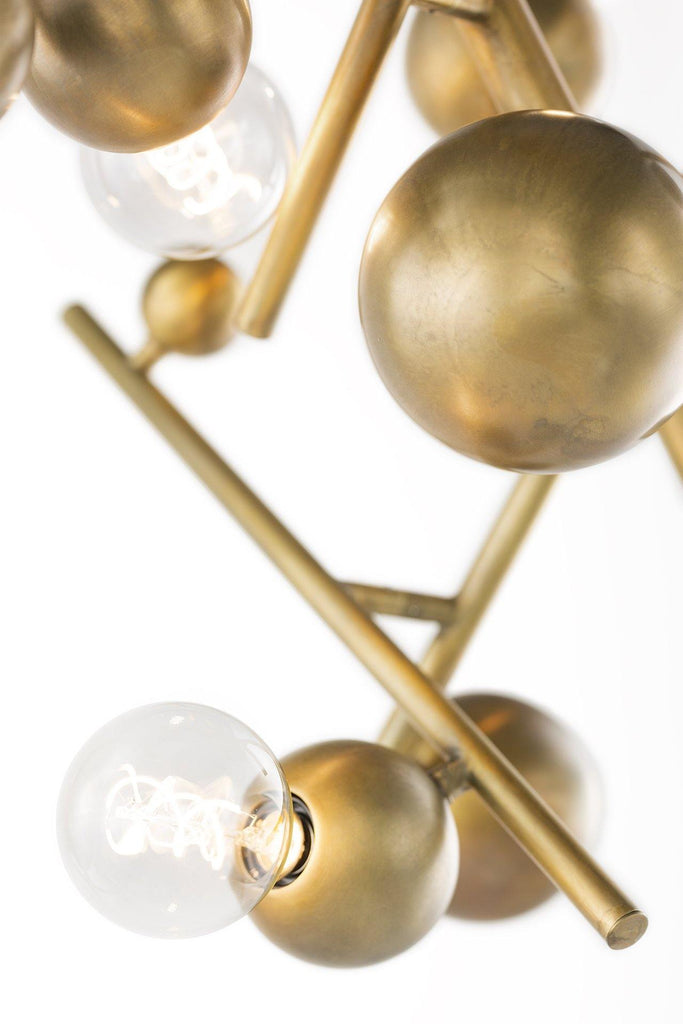 Modern brass-colored Galaxy Chandelier Round with spherical elements and exposed globe bulbs