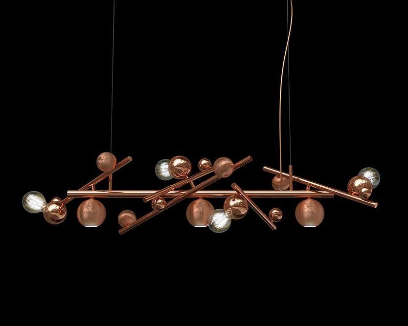 Modern copper-toned Galaxy Hanging Lamp Long with spherical lights and intersecting bars