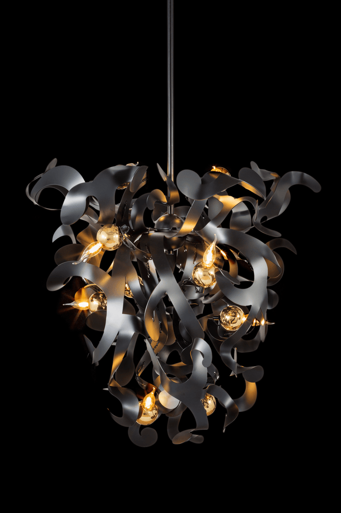 Kelp Chandelier Conical with metallic ribbon-like elements and exposed warm bulbs