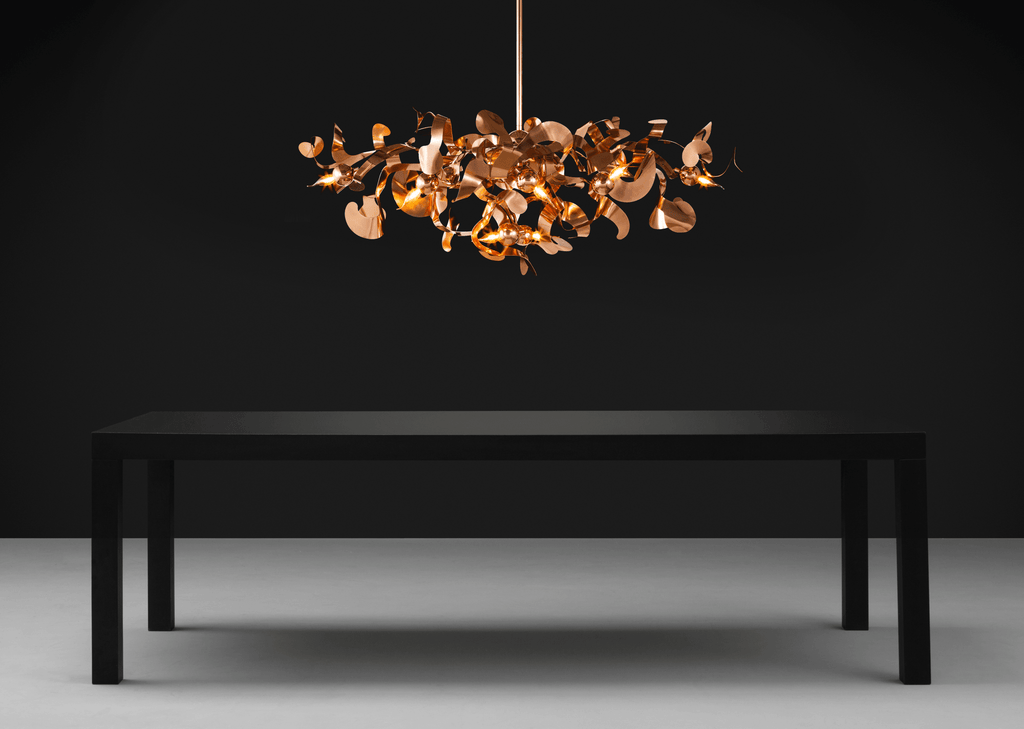 Kelp Chandelier Oval with metallic leaf-like accents in copper or rose gold finish