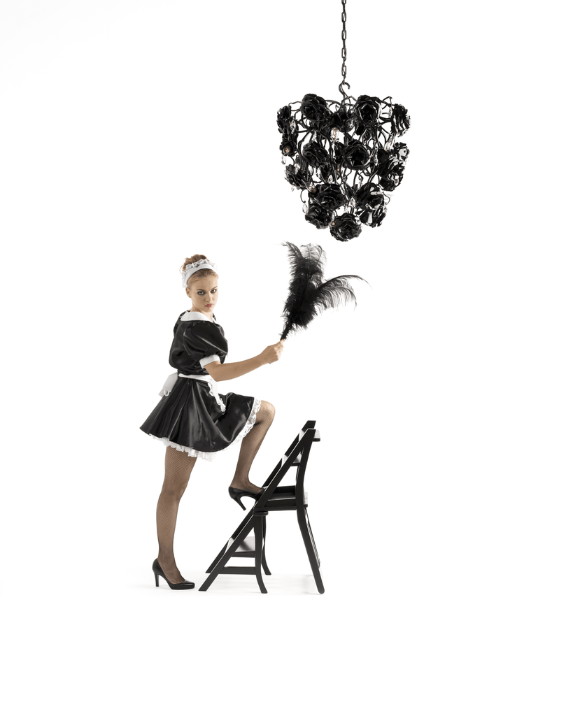 Woman in maid costume holding feather duster under Love You Love You Not Chandelier Conical