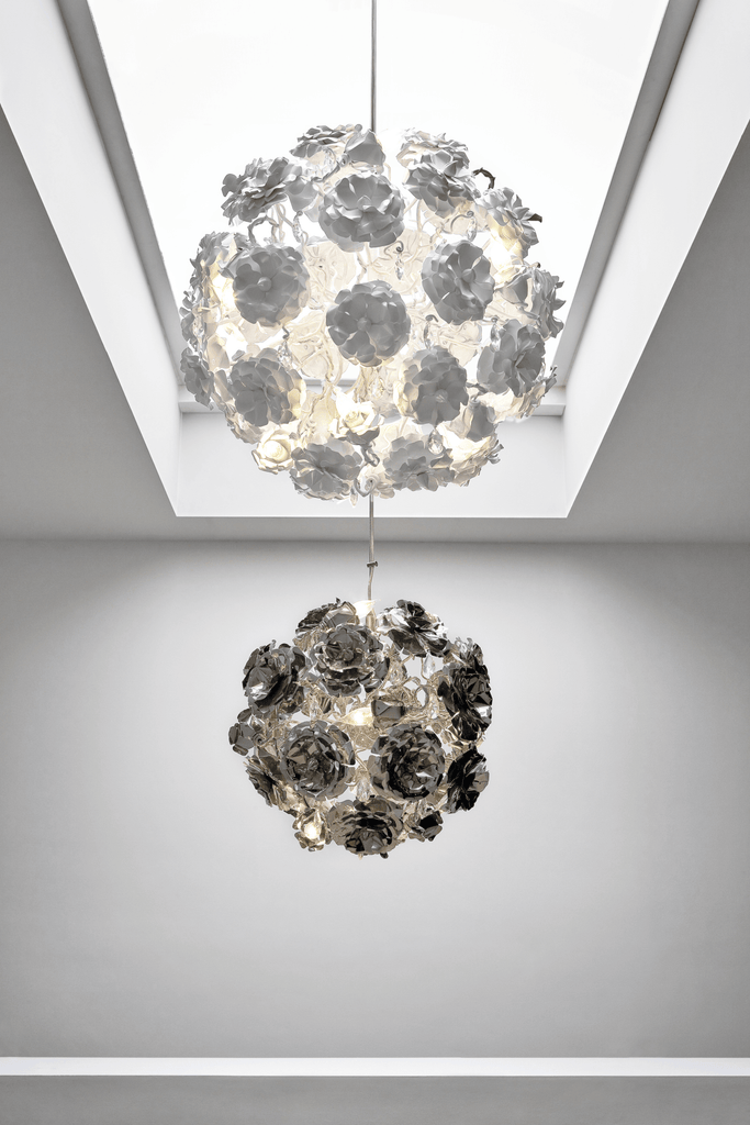 Elegant floral-design hanging lamp with white and dark chandeliers for stylish decor