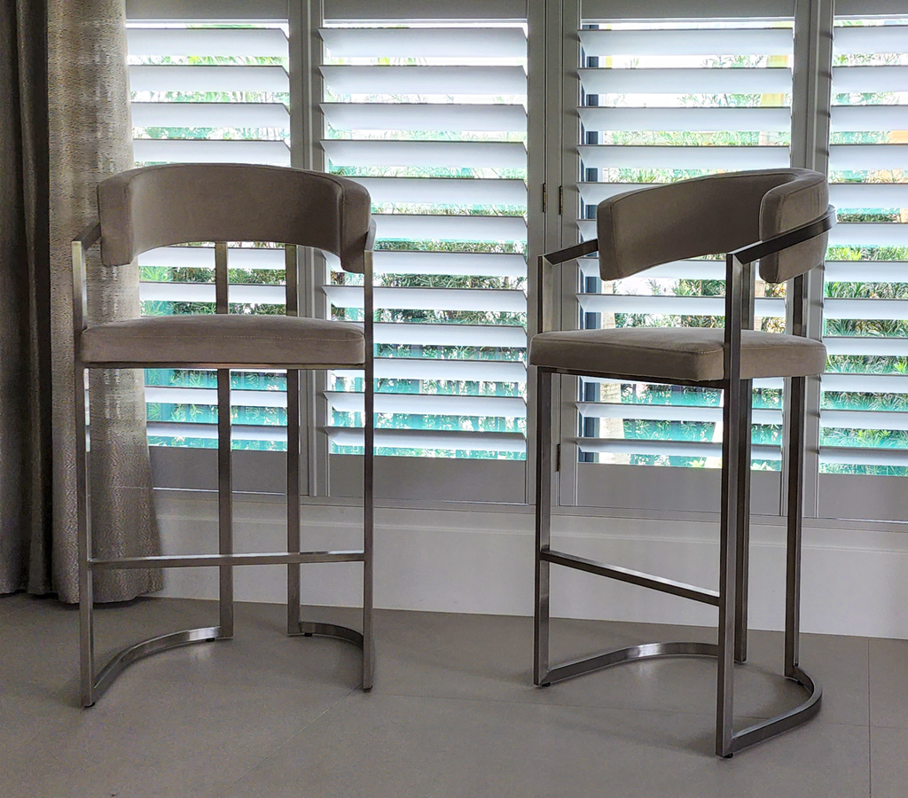 Matera counter bar chair with upholstered seats and polished metal frames