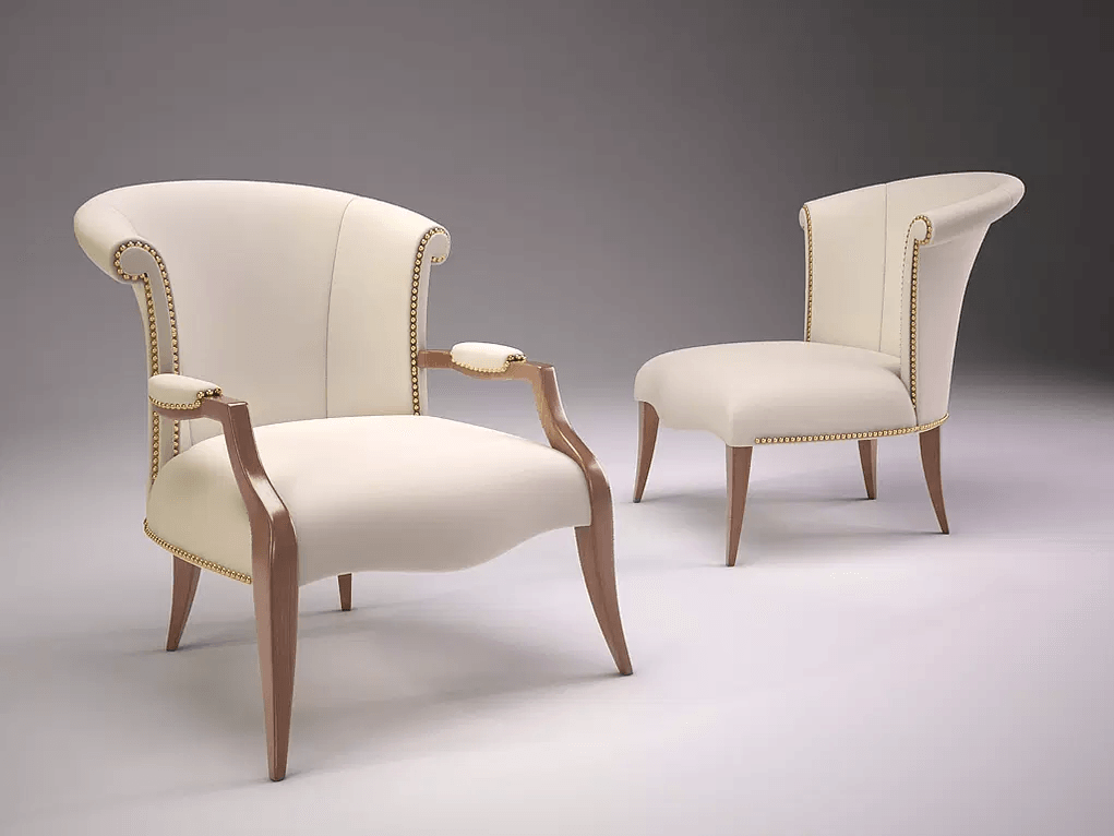 Elegant cream upholstered Melrose Chair with exposed wood frames and brass nailhead trim