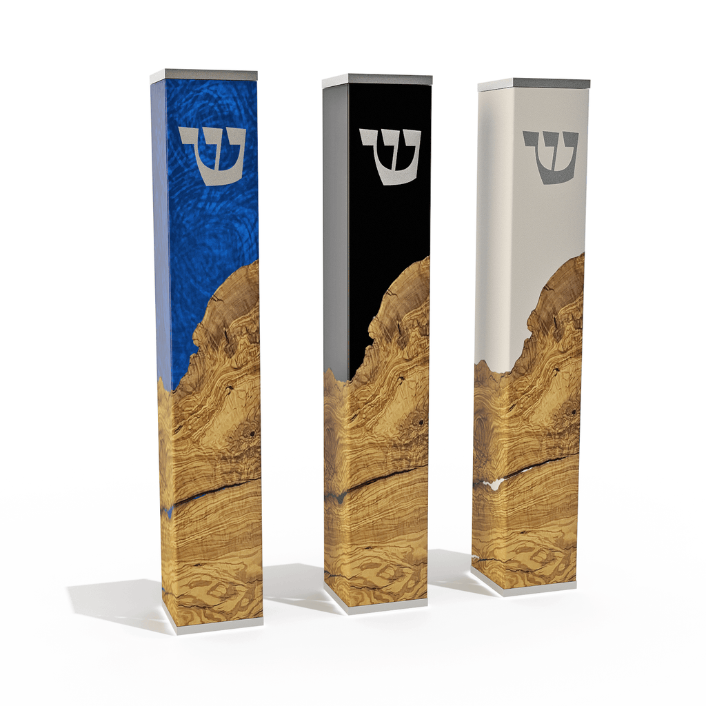 Modern mezuzah with three tall rectangular cases featuring unique wood grain and colorful resin tops