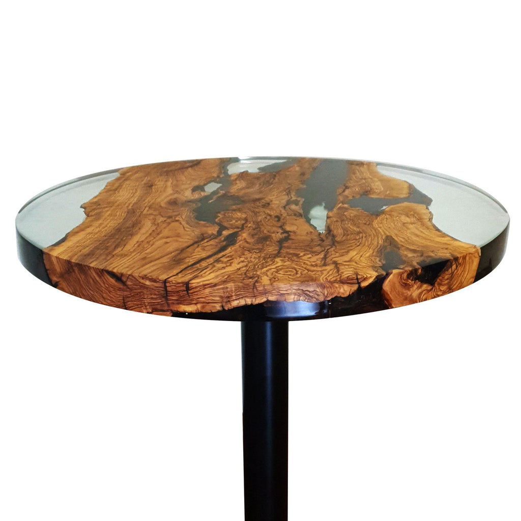 Olive Wood Round Dining Table with epoxy resin top and black pedestal base