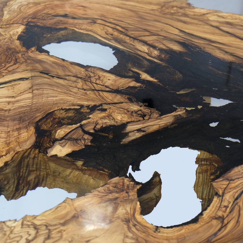 Ombrone Olive Dining Table with wooden slab and natural resin-filled holes
