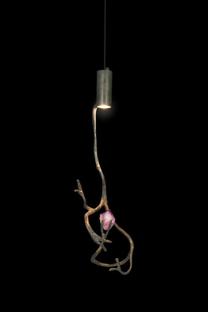 Orpheus Amethyst Hanging Lamp with metallic cylinder, glowing light, and pink crystalline accent