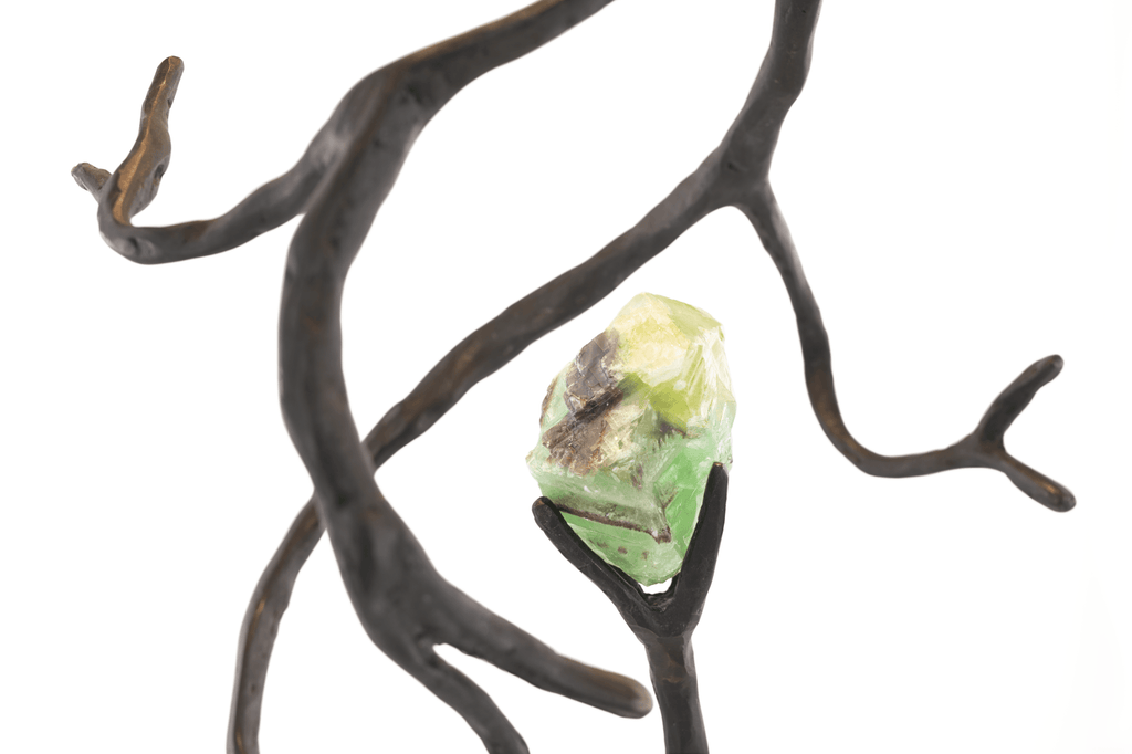 Raw green and yellow Orpheus Green Calcite semi precious stone in a green calcite hanging lamp