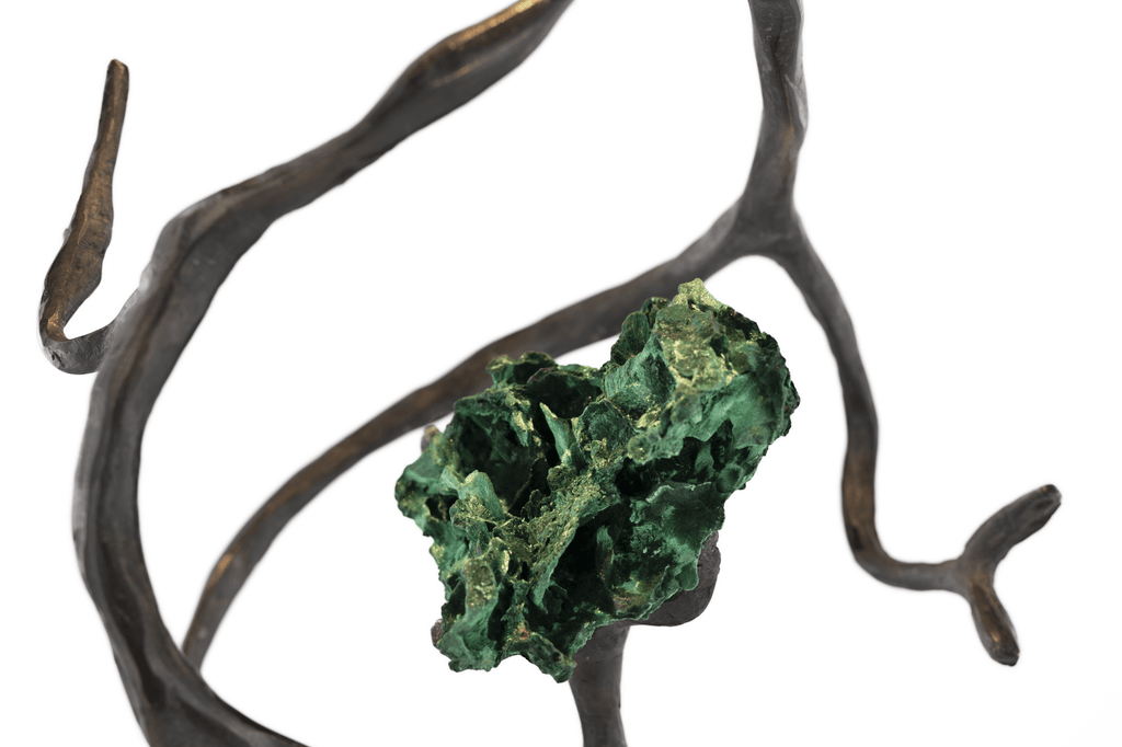 Raw green malachite crystal on dark metal branch in Orpheus Malachite Hanging Lamp