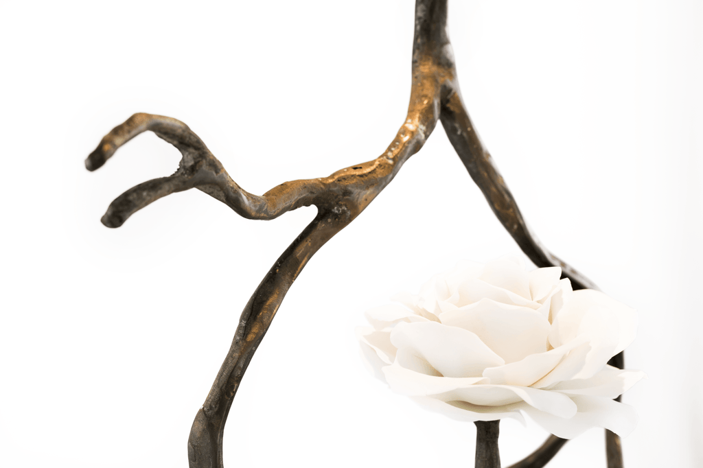 Bronze bird-like sculpture with white flower on Orpheus Nymphenburg porcelain hanging lamp