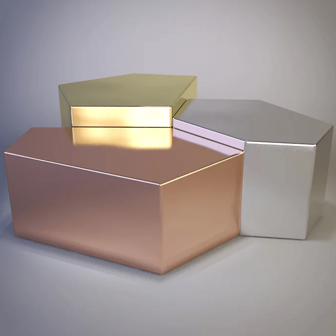 Metallic geometric boxes in gold silver and rose gold for Quarry Cocktail Table display