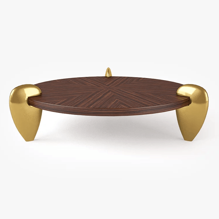Remedy Cocktail Table with dark wood top, golden legs, and geometric pattern design