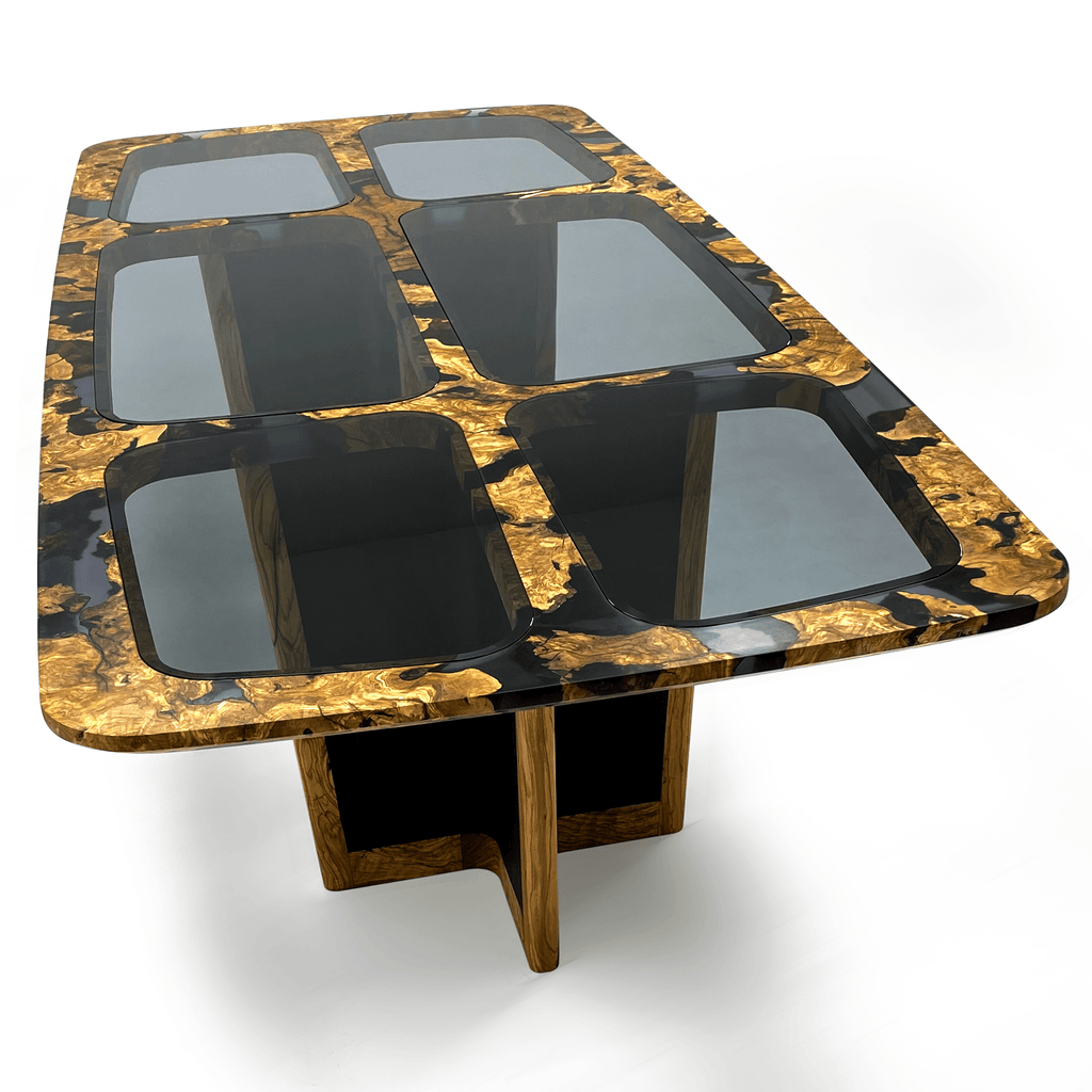 Salamis Dining Table with black epoxy resin, gold-toned wood, and glass panels