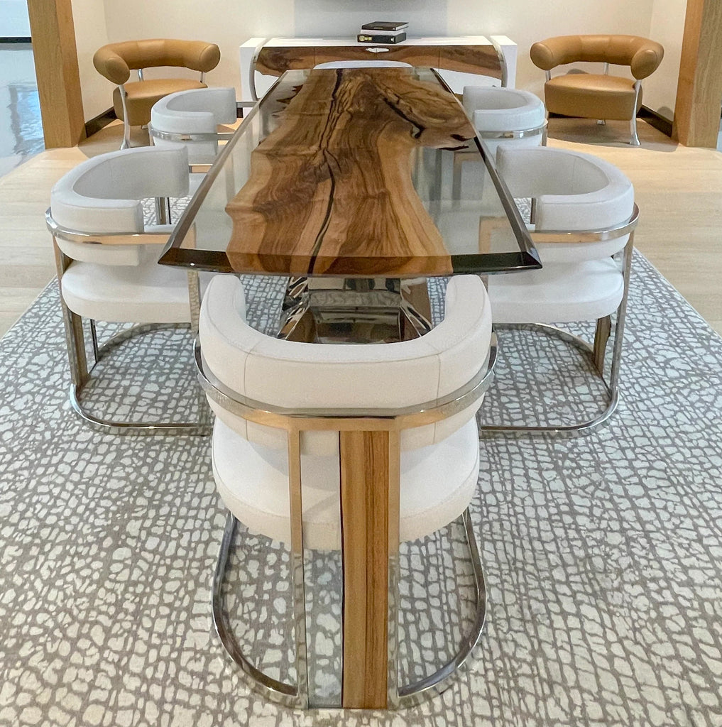 Signature Walnut Dining Table with live-edge wood slab top and white upholstered chairs