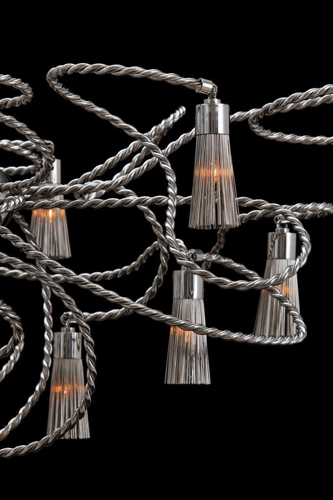 Decorative tangled lights with silver cords and tassel bulbs on Sultans Of Swing Chandelier Oval