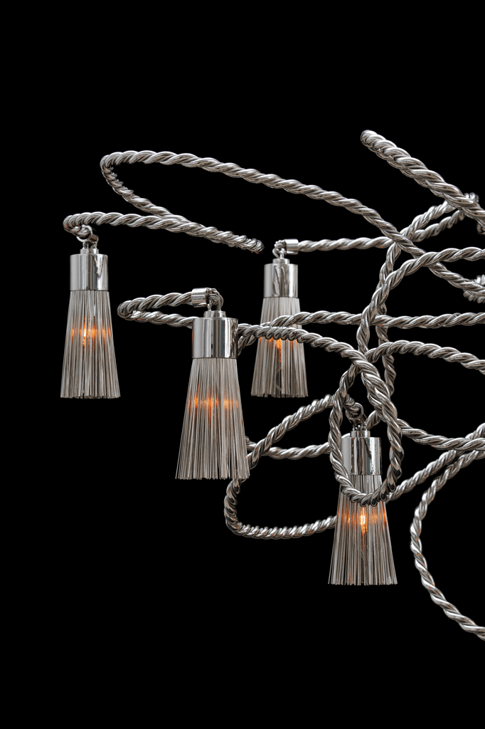 Silver twisted rope string lights with tassel-shaped bulbs for Sultans Of Swing Chandelier Oval