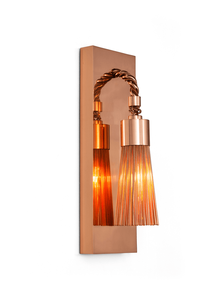 Modern copper swing wall lamp with twisted arm and delicate fringe for stylish lighting
