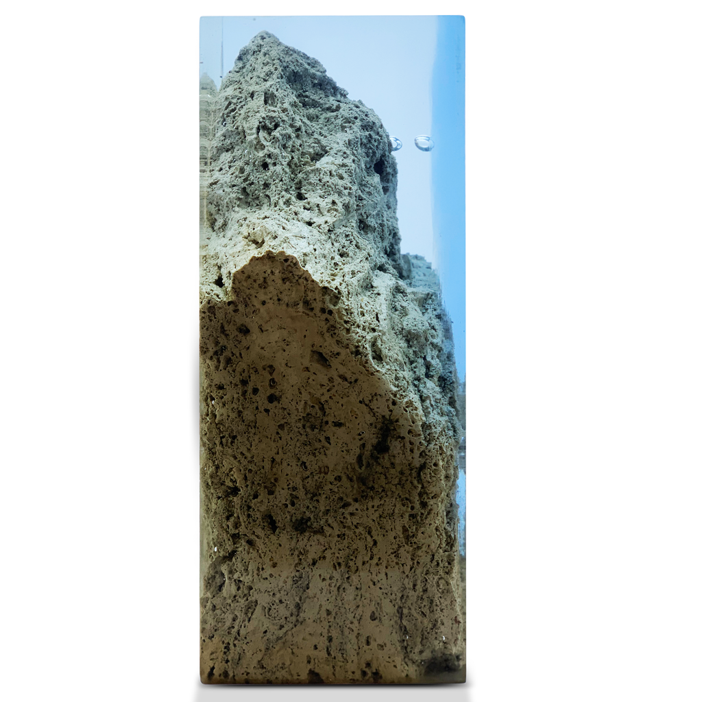 Travertine Rock Decorative Cube featuring a clear resin encasing textured travertine rock