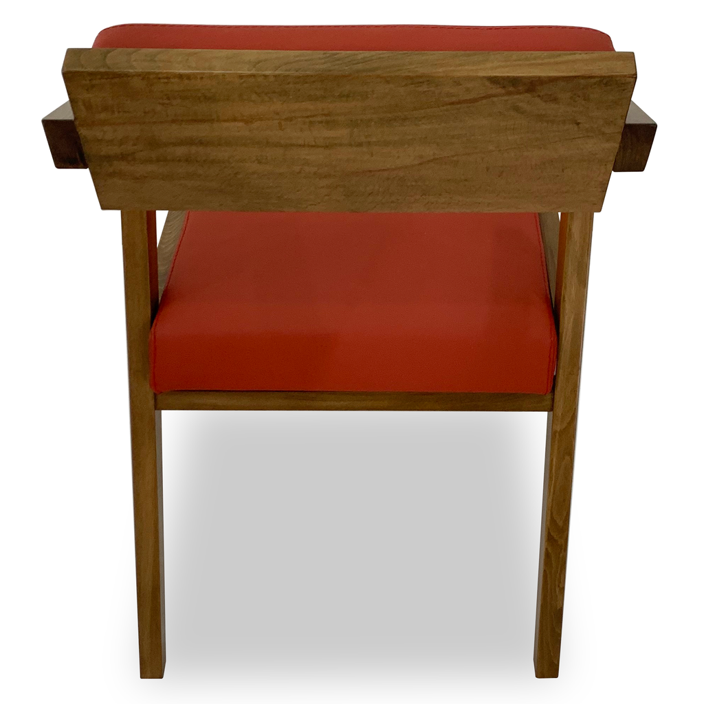 Vernazza Dining Chair with wooden frame and orange cushion for stylish dining spaces